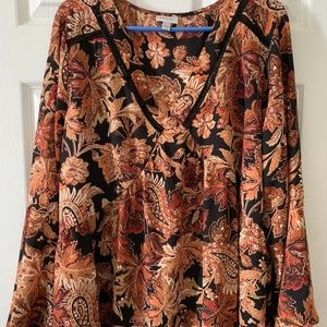 Fall-themed blouse with bell sleeves